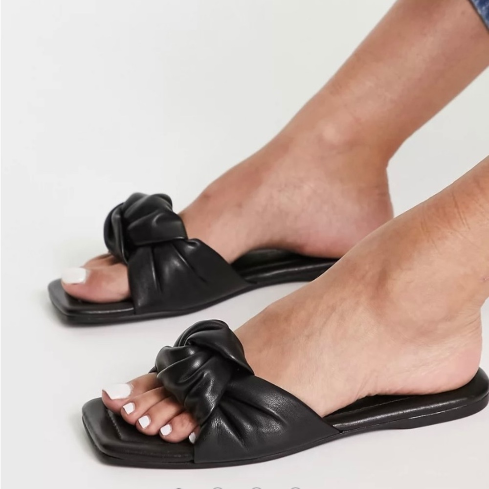 Asos Stradivarius padded knot flat sandal in black.